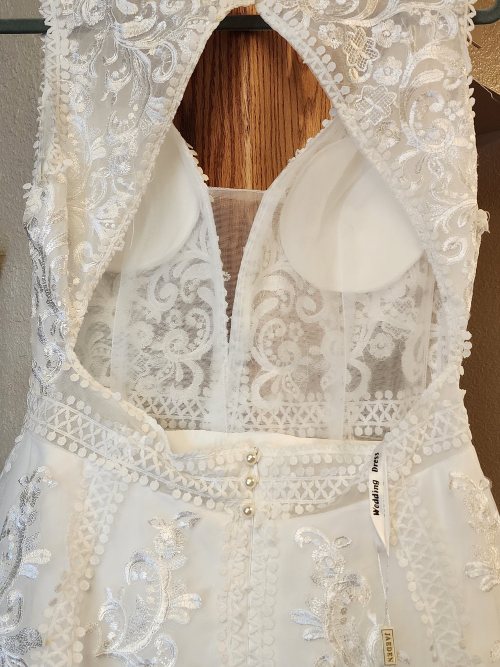 Elegant White Lace A-Line Wedding Dress with V-Neck - Picture 4 of 6